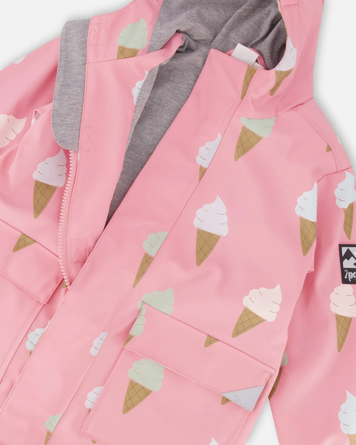 Pink Raincoat With Cones That Change Color Upon Contact With Water